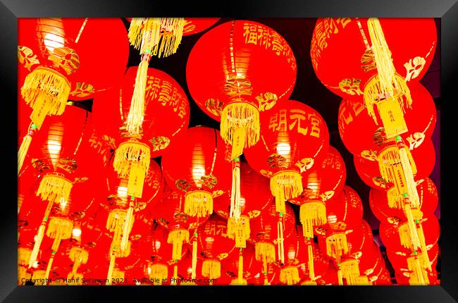 Red lantern roof decoration for Chinese New Year Framed Print by Hanif Setiawan