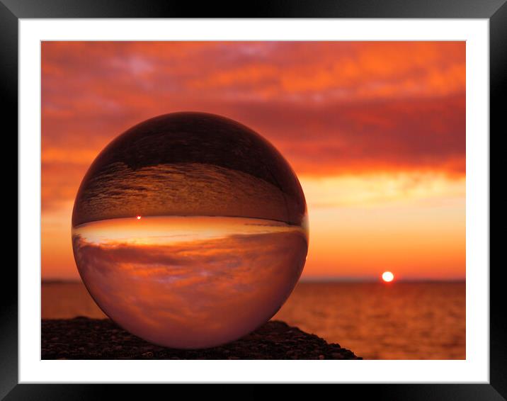 Orange sky at night through sphere Framed Mounted Print by Ann Biddlecombe