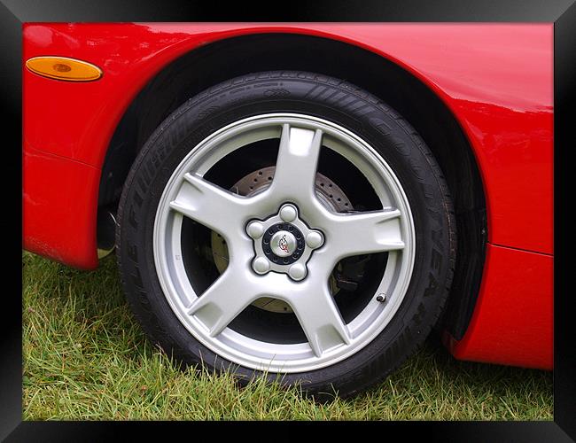 Red Corvette front wheel and wheel arch Framed Print by Allan Briggs