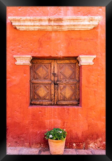 Wooden window shutters, red wall in the Santa Catalina Monastery, Peru Framed Print by Phil Crean