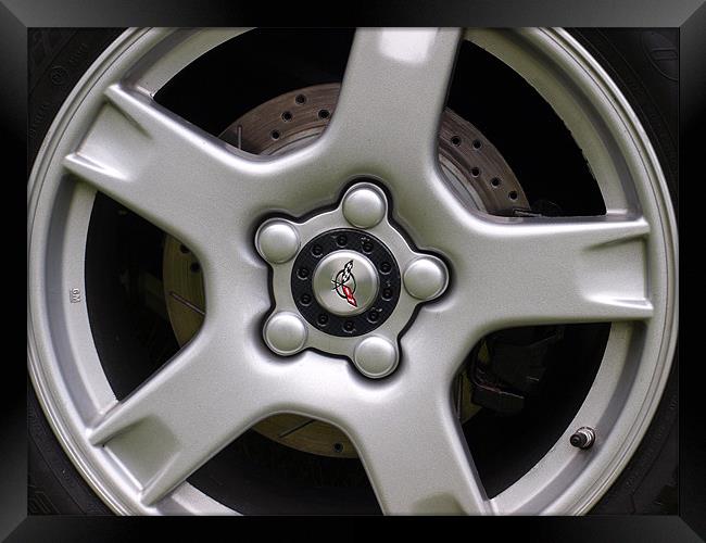 Corvette wheel showing brake disc Framed Print by Allan Briggs