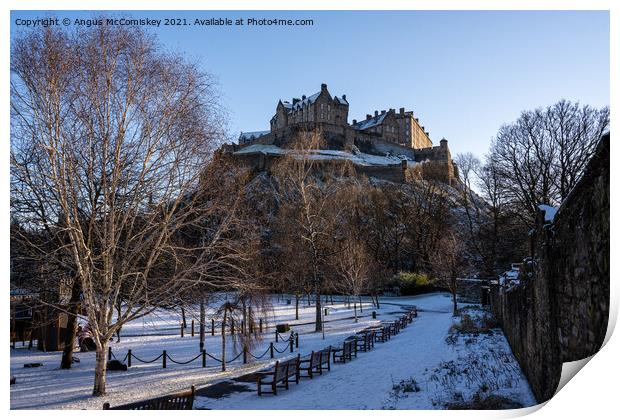 Edinburgh Castle snow from Princes Street Gardens Print by Angus McComiskey