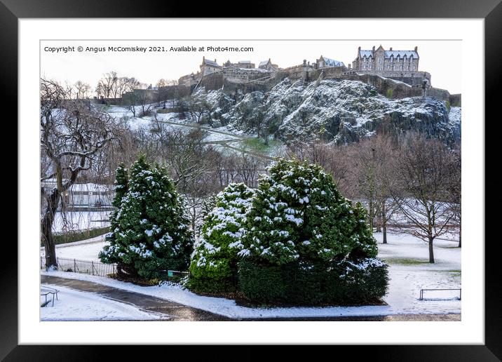 Princes Street Gardens Edinburgh in snow Framed Mounted Print by Angus McComiskey