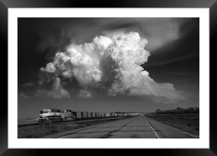 Storm over Freight train, Tornado alley, USA. Framed Mounted Print by John Finney