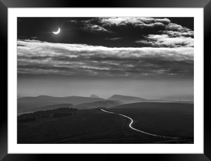 Moon shadow (Solar eclipse).  Framed Mounted Print by John Finney