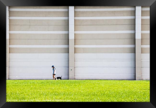 Girl walking dog Framed Print by Kevin Hellon