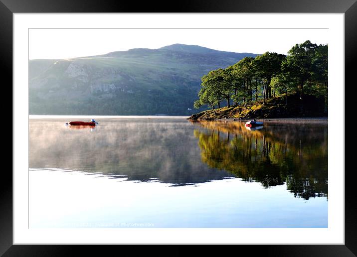 Morning mist on Derwent Water at Keswick in Cumbria. Framed Mounted Print by john hill