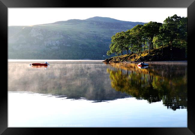 Morning mist on Derwent Water at Keswick in Cumbria. Framed Print by john hill