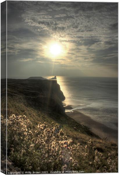 Sun setting across Worms Head, Rhosilli, The Gower Canvas Print by Philip Brown