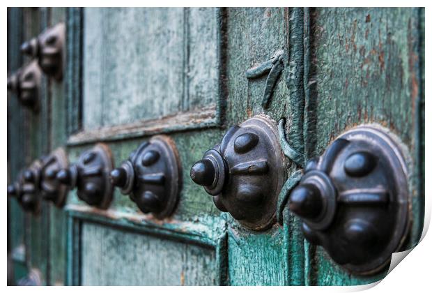 Studs on the door to Cusco cathedral, Peru Print by Phil Crean