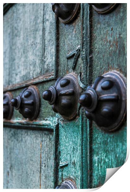 Studs on the door to Cusco cathedral, Peru Print by Phil Crean