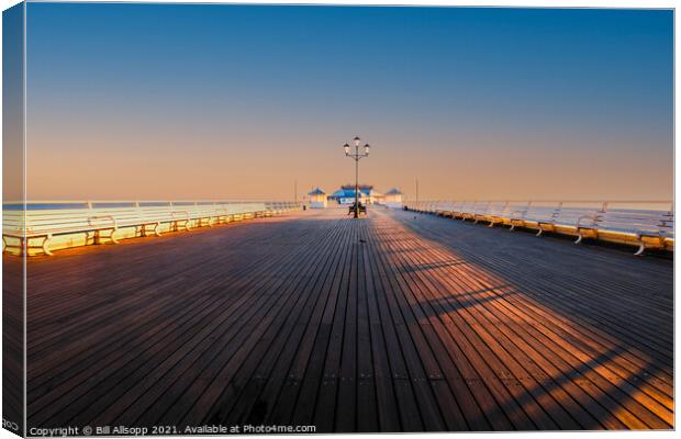 The pier at dawn. Canvas Print by Bill Allsopp
