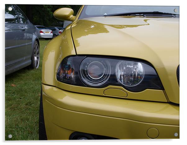 Gold BMW headlight close up Acrylic by Allan Briggs