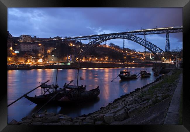 Evening at Douro River in Porto Framed Print by Artur Bogacki