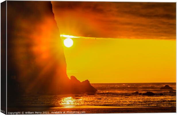 Colorful Sun Rays Haystack Rock Sea Stack Canon Beach Oregon Canvas Print by William Perry