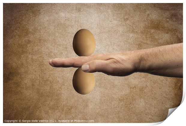 two eggs on the hand Print by Sergio Delle Vedove