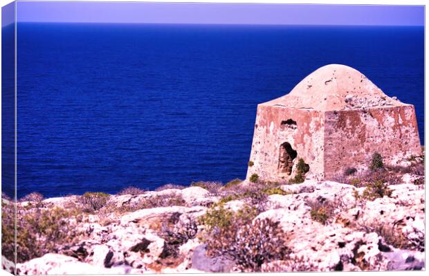 Crete or Kreta, Greece - September 15, 2017: Ruin of ottoman building on Gramvousa on venetian fort against deep blue sea, Wide angle shot of Kissamos Canvas Print by Arpan Bhatia