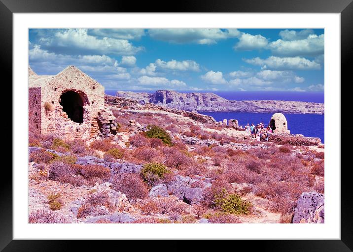Crete or Kreta, Greece - September 15, 2017: Ruin of ottoman building on Gramvousa on venetian fort against deep blue sea, Wide angle shot of Kissamos against rocky mountain on sea Framed Mounted Print by Arpan Bhatia