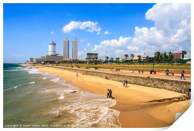 People walking on Galle Face beach Print by Kevin Hellon