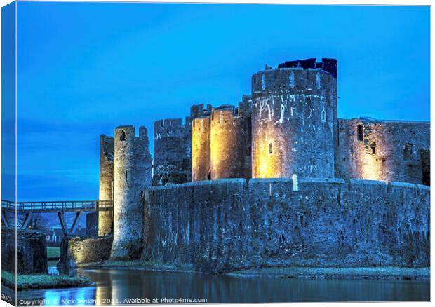 Caerphilly Castle Floodlit at Night South Wales Canvas Print by Nick Jenkins