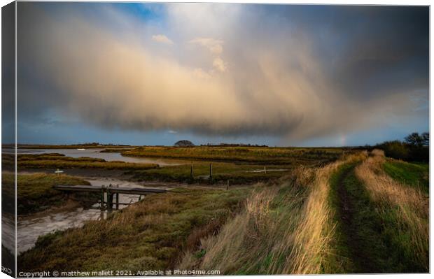Weather Over Hamford Waters Canvas Print by matthew  mallett