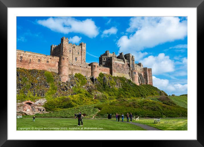 Bamburgh Castle Northumberland Framed Mounted Print by Angus McComiskey