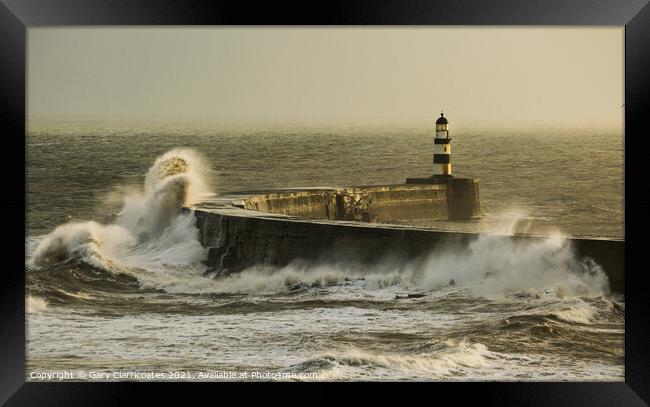 Seaham Lighthouse and Pier Under Attack Framed Print by Gary Clarricoates