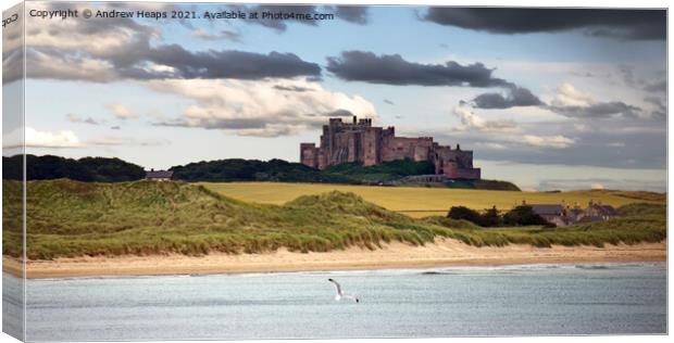 Majestic Bamburgh Castle Standing Tall Canvas Print by Andrew Heaps