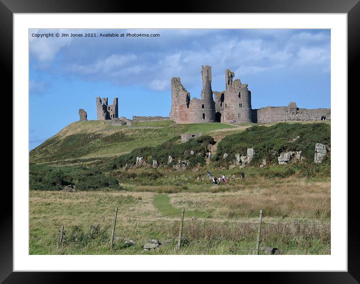 Majestic Ruins of Dunstanburgh Castle in Northumbe Framed Mounted Print by Jim Jones