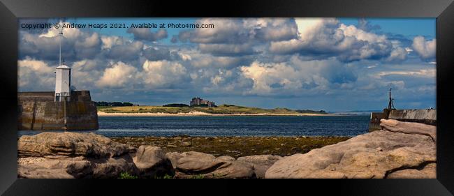 Bamburgh Castle viewed from Seahouses Framed Print by Andrew Heaps
