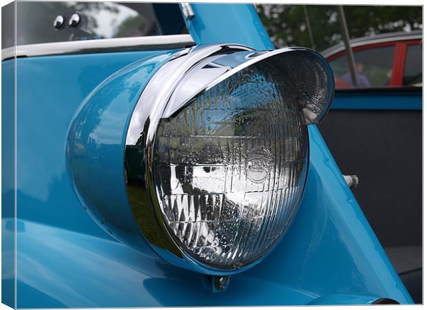 Blue Isetta bubble car headlight Canvas Print by Allan Briggs