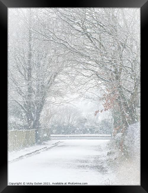 Snowy Avenue in Alderley Edge Framed Print by Vicky Outen