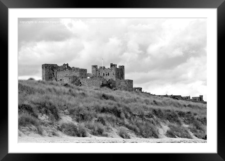 Banburgh Castle in Northumberland Framed Mounted Print by Andrew Heaps