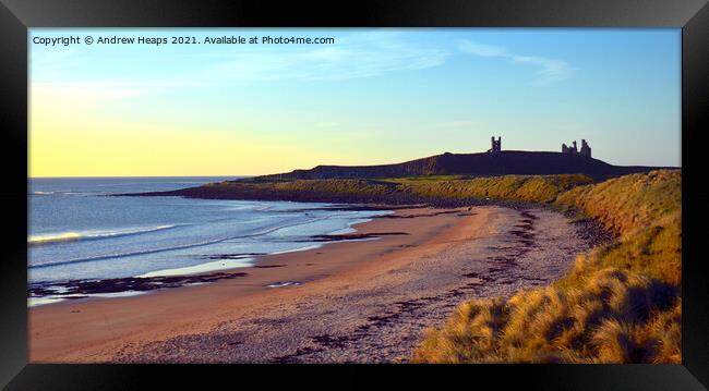 Sunset scene looking towards Dunstanburgh Castle. Framed Print by Andrew Heaps