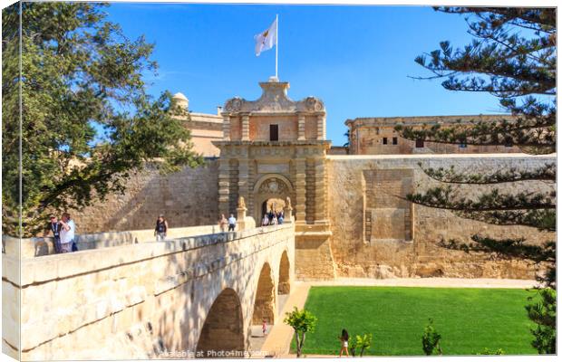Tourists using the bridge across to the Mdina. Canvas Print by Kevin Hellon