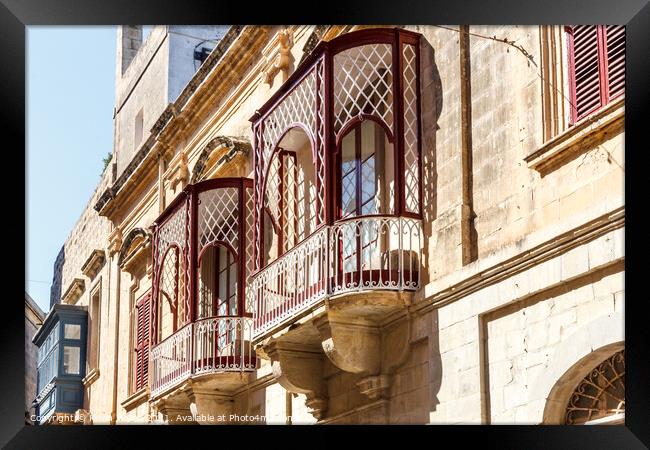 Traditional balconies in Valletta Framed Print by Kevin Hellon