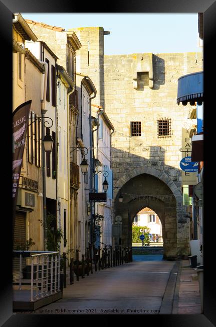 A street inside the Fortress of Aigues Mortes Framed Print by Ann Biddlecombe