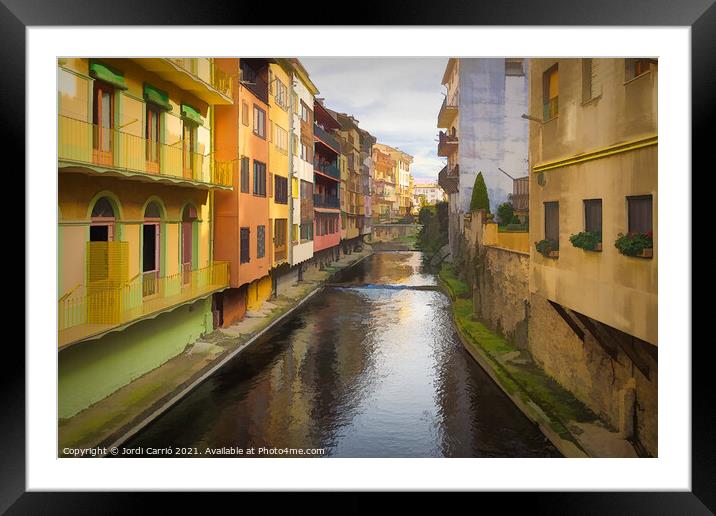 Painted houses bordering the Ritort river in Camprodon Framed Mounted Print by Jordi Carrio
