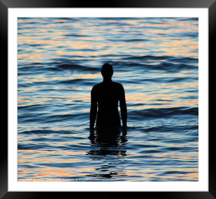 Silhouette of Iron Man at Twilight  Framed Mounted Print by Helen Jones
