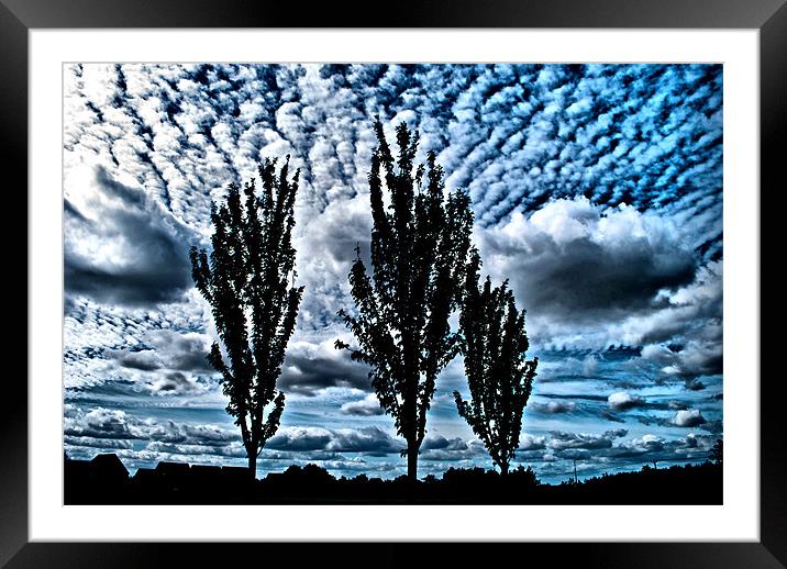 Clouds and Silhouettes Framed Mounted Print by Karen Martin