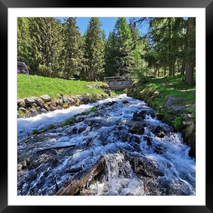 A waterfall with trees in the background Framed Mounted Print by Tim Lu