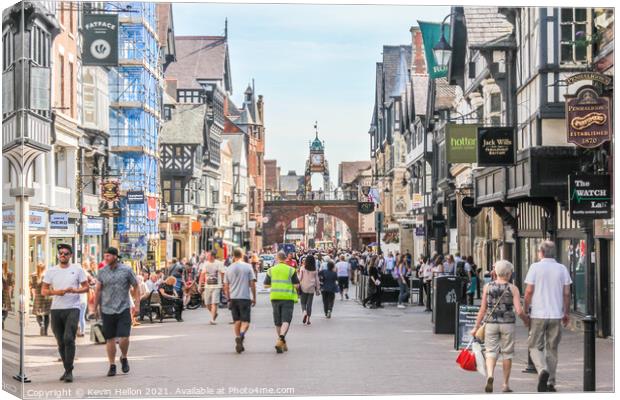 Shoppers walking in Eastgate street Canvas Print by Kevin Hellon