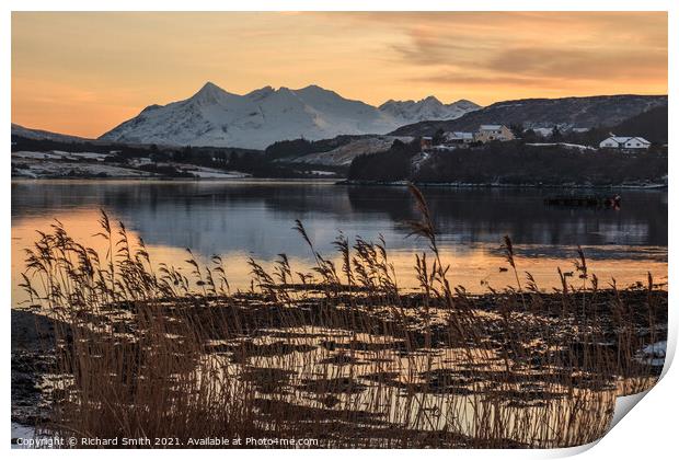Cuillin reflections in Loch Portree, reeds in the foreground.  Print by Richard Smith