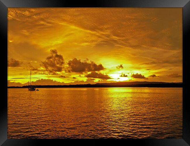 Golden coastal cloudy sunrise seascape. Framed Print by Geoff Childs