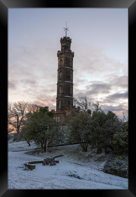 A snow covered Calton Hill looking over the Nelson Monument Framed Print by Miles Gray