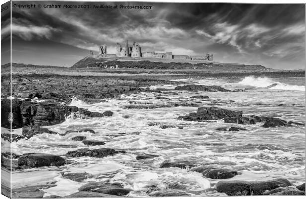 Dunstanburgh Castle from the south monochrome Canvas Print by Graham Moore