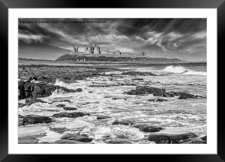 Dunstanburgh Castle from the south monochrome Framed Mounted Print by Graham Moore