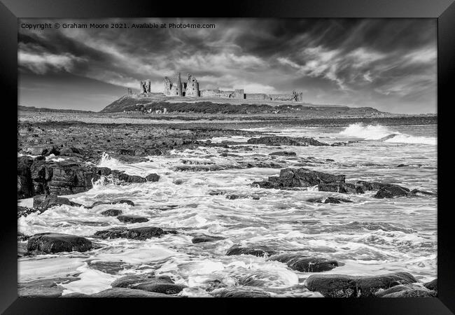 Dunstanburgh Castle from the south monochrome Framed Print by Graham Moore