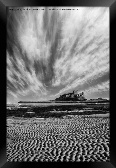 Bamburgh Castle with streaky clouds monochrome Framed Print by Graham Moore