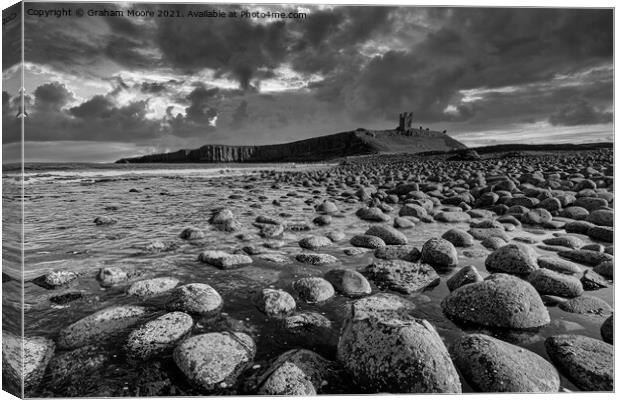 Dunstanburgh Castle from the north monochrome Canvas Print by Graham Moore